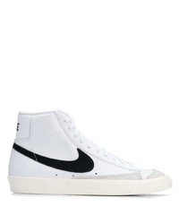 Sneakers alte bianche e nere di Nike