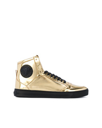 Sneakers alte decorate dorate di Versace