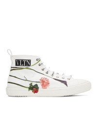 Sneakers alte di tela a fiori bianche