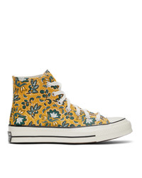 Sneakers alte di tela a fiori gialle