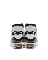 Sneakers alte di tela bianche e blu di Converse