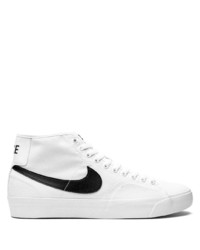 Sneakers alte di tela bianche e nere di Nike