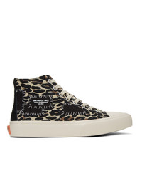 Sneakers alte di tela leopardate beige