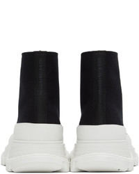 Sneakers alte di tela nere e bianche di Alexander McQueen