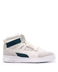Sneakers alte in pelle bianche e blu scuro di Puma