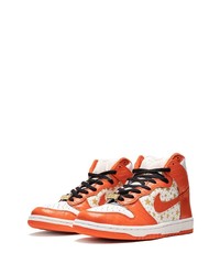 Sneakers alte in pelle stampate arancioni di Nike