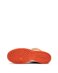 Sneakers alte in pelle stampate arancioni di Nike