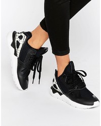 Sneakers alte nere di adidas