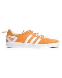 Sneakers basse arancioni di adidas