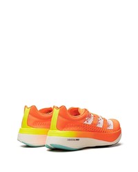 Sneakers basse arancioni di adidas