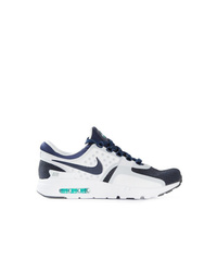 Sneakers basse bianche e blu scuro di Nike