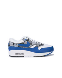 Sneakers basse bianche e blu di Nike