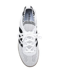 Sneakers basse bianche e nere di adidas