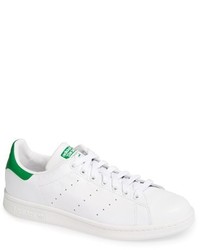 Sneakers basse bianche e verdi