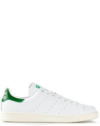Sneakers basse bianche e verdi di adidas