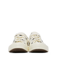 Sneakers basse di tela a pois bianche e nere di Comme Des Garcons Play