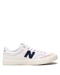 Sneakers basse di tela bianche e blu scuro di New Balance