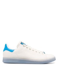 Sneakers basse di tela bianche e blu di adidas