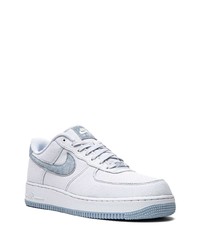 Sneakers basse di tela bianche e blu di Nike