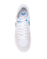 Sneakers basse di tela bianche e blu di Nike