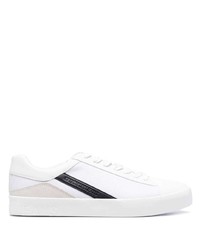 Sneakers basse di tela bianche e nere di Calvin Klein