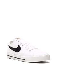 Sneakers basse di tela bianche e nere di Nike