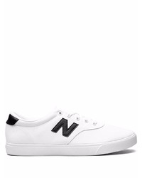 Sneakers basse di tela bianche e nere di New Balance