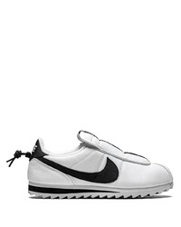 Sneakers basse di tela bianche e nere di Nike