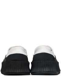 Sneakers basse di tela bianche e nere di Jil Sander