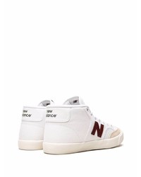 Sneakers basse di tela bianche e rosse di New Balance