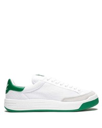 Sneakers basse di tela bianche e verdi di adidas
