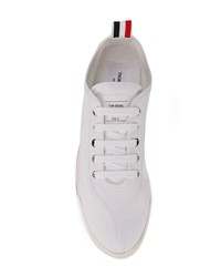 Sneakers basse di tela bianche di Thom Browne