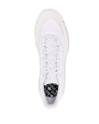 Sneakers basse di tela bianche di adidas