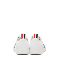 Sneakers basse di tela bianche di Thom Browne