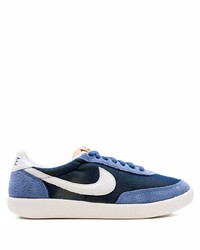 Sneakers basse di tela blu scuro e bianche di Nike