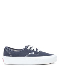 Sneakers basse di tela blu scuro e bianche di Vans