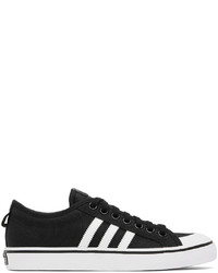 Sneakers basse di tela nere e bianche di adidas Originals