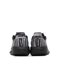 Sneakers basse di tela nere e bianche di adidas x Missoni