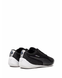Sneakers basse di tela nere e bianche di Puma