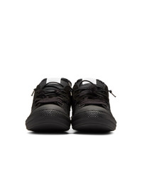 Sneakers basse di tela nere di Maison Margiela