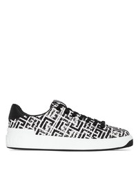 Sneakers basse di tela stampate bianche e nere di Balmain