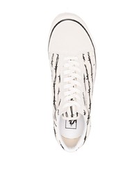 Sneakers basse di tela stampate bianche e nere di Vans
