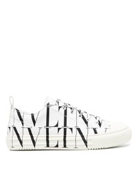 Sneakers basse di tela stampate bianche e nere di Valentino Garavani