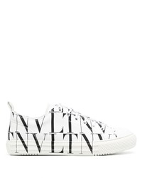 Sneakers basse di tela stampate bianche e nere di Valentino Garavani