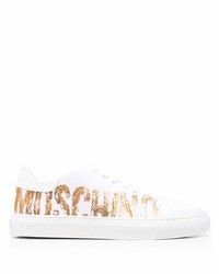 Sneakers basse di tela stampate bianche di Moschino