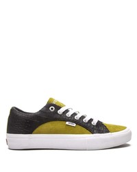 Sneakers basse di tela verde oliva di Vans