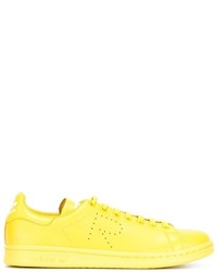 Sneakers basse gialle di Adidas By Raf Simons