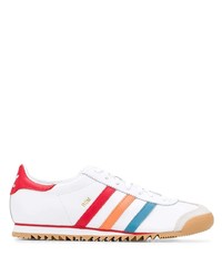 Sneakers basse in pelle a righe orizzontali bianche di adidas