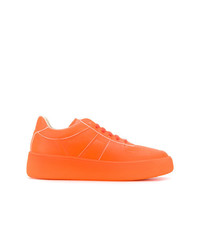 Sneakers basse in pelle arancioni di Maison Margiela
