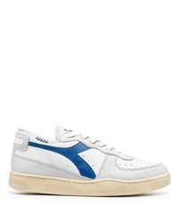 Sneakers basse in pelle bianche e blu scuro di Diadora
